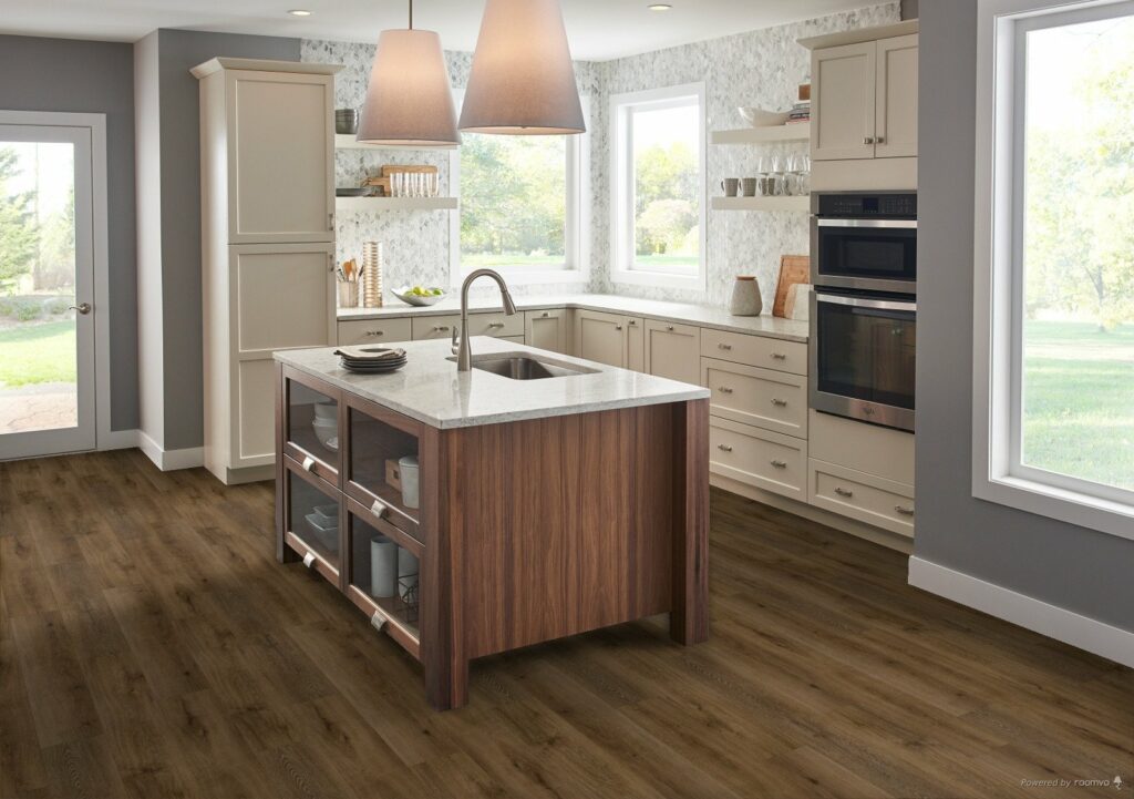 Dark wood-look vinyl flooring in a bright modern kitchen | Bay Country Floors